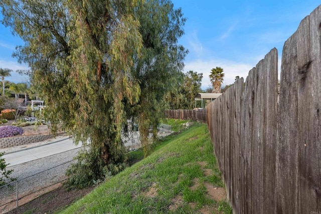 view of yard with fence