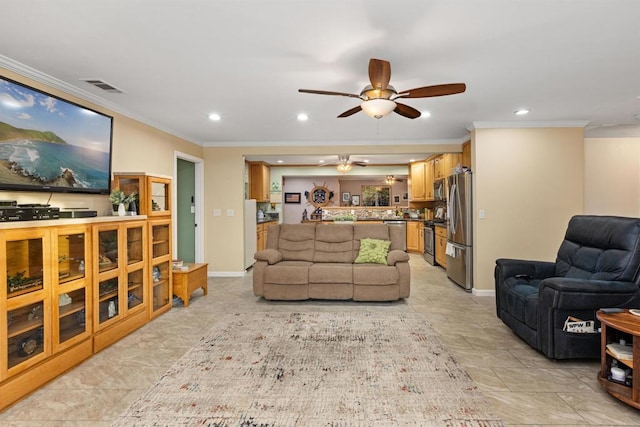 living room featuring visible vents, ornamental molding, recessed lighting, baseboards, and ceiling fan