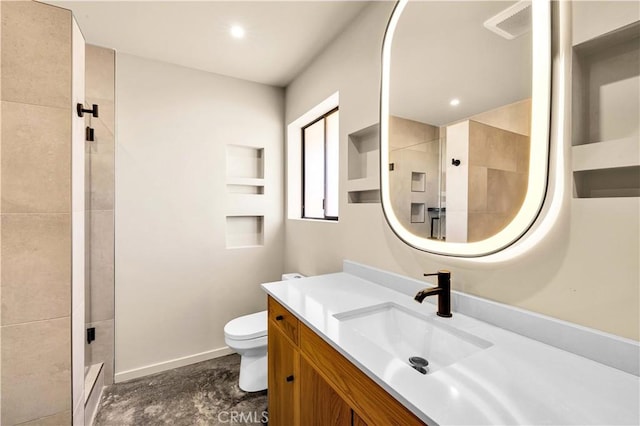 bathroom with toilet, recessed lighting, vanity, baseboards, and a tile shower