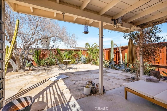 view of patio with a fenced backyard