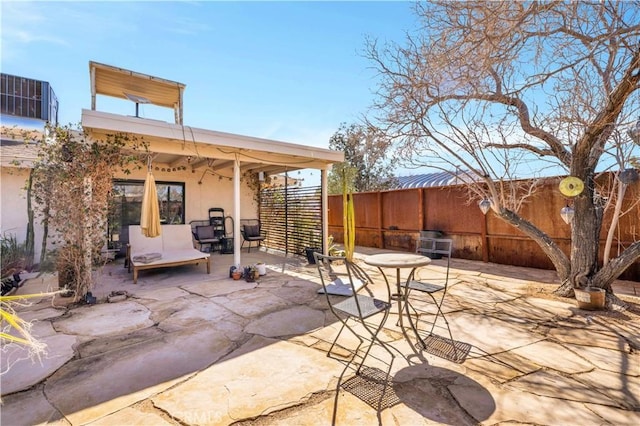 view of patio / terrace with fence