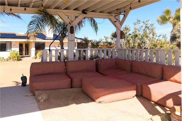 view of patio featuring french doors and an outdoor living space