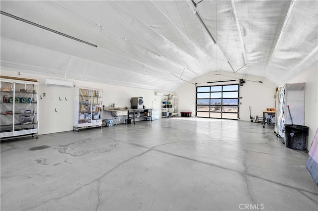 garage with an AC wall unit