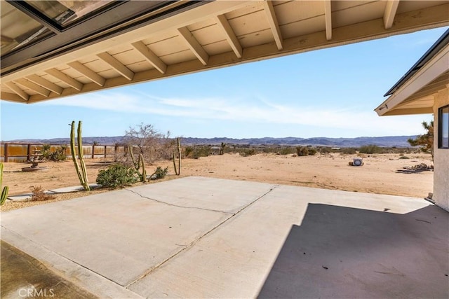 view of patio with a mountain view