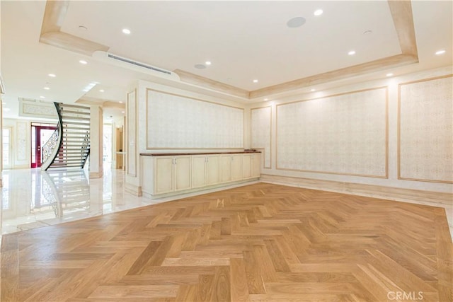 spare room featuring recessed lighting, visible vents, and stairs