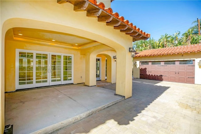 view of patio featuring french doors