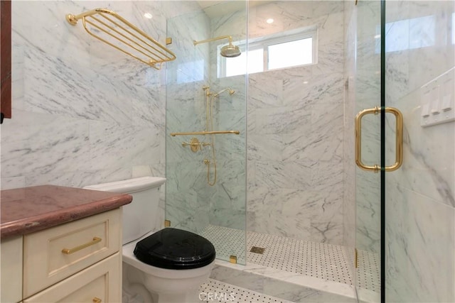 full bathroom featuring toilet and a marble finish shower