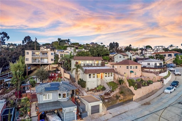 aerial view at dusk with a residential view