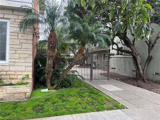 view of gate with fence