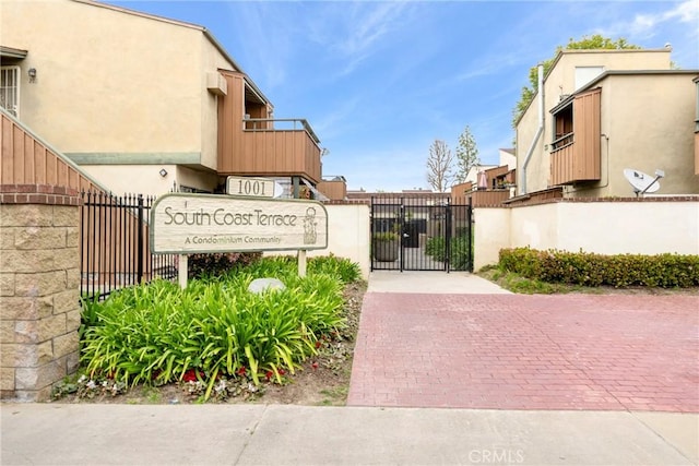 exterior space with fence and a gate