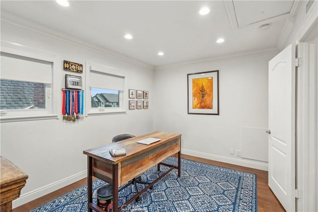 office space with crown molding, baseboards, and wood finished floors