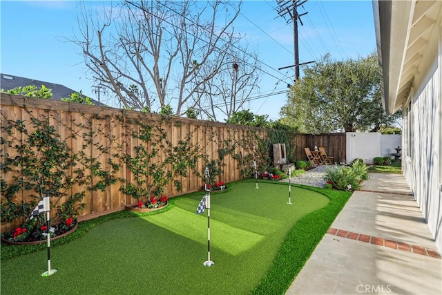 view of yard featuring a fenced backyard