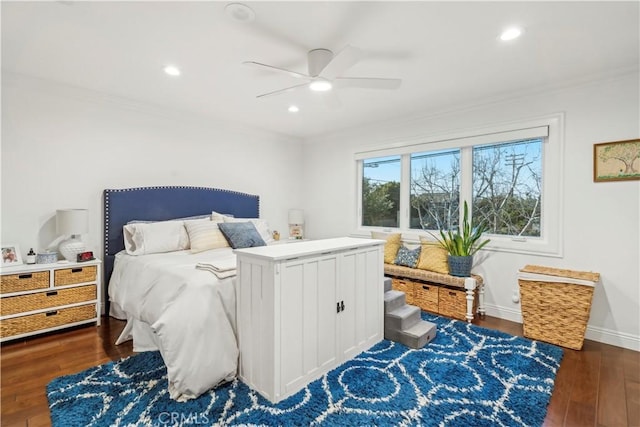 bedroom with baseboards, dark wood-style flooring, recessed lighting, and crown molding