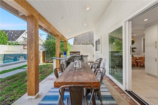 view of patio / terrace with outdoor dining area and a fenced backyard