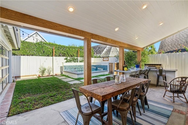 view of patio / terrace featuring outdoor dining area and a fenced backyard