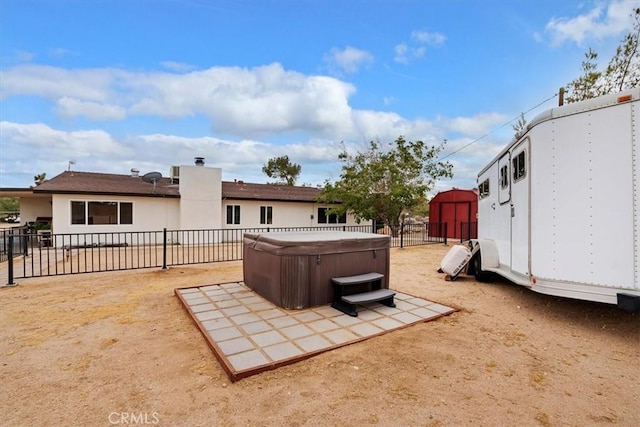 58676 Sunflower Dr, Yucca Valley, CA 92284 - fenced backyard with a hot tub and a patio