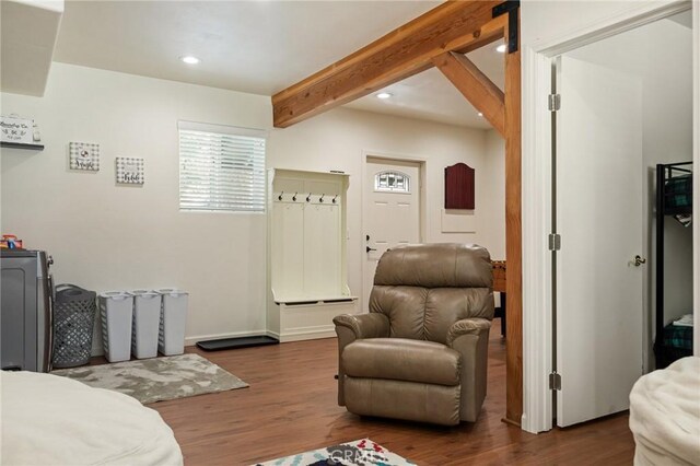 bedroom with recessed lighting, wood finished floors, and beamed ceiling