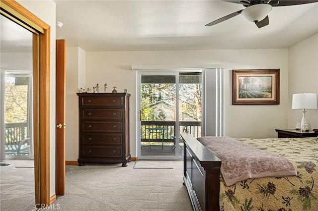 bedroom featuring light carpet, access to exterior, ceiling fan, and baseboards