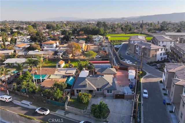 aerial view featuring a mountain view and a residential view