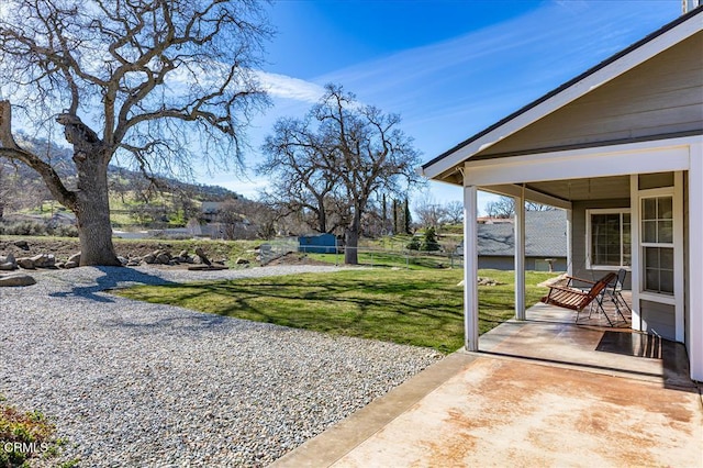 view of yard featuring fence