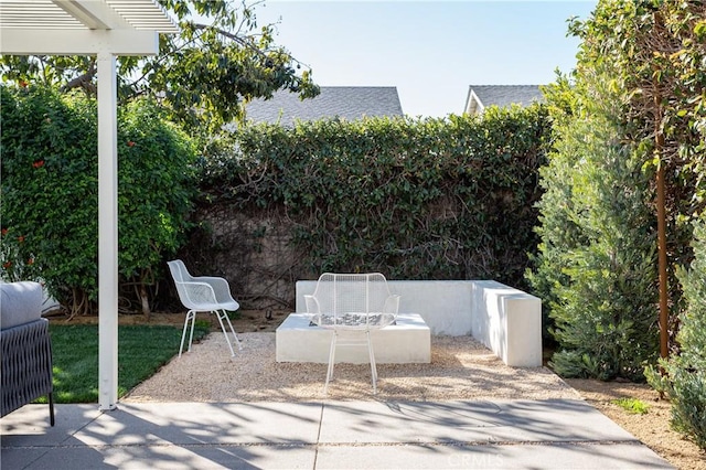 view of patio featuring a pergola