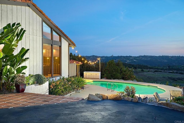 pool featuring a patio area