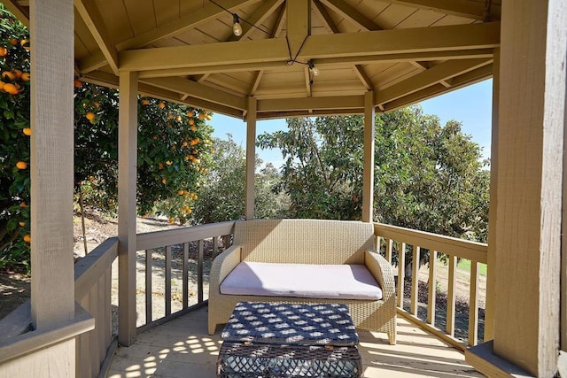 wooden deck featuring a gazebo