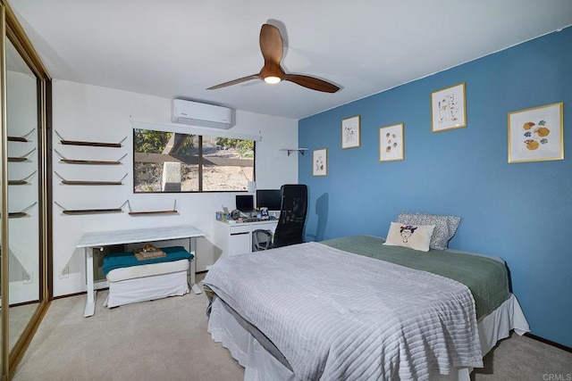 bedroom featuring a wall unit AC, ceiling fan, baseboards, and carpet flooring