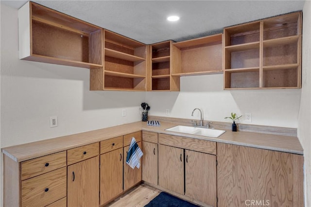1131 Apple Ave, Wrightwood, CA 92397 - kitchen with light countertops, open shelves, recessed lighting, and a sink