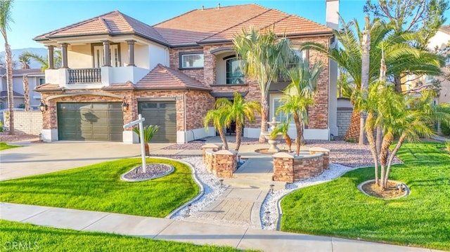 view of front of house with a garage, driveway, a front yard, and stucco siding