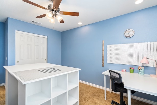 office with recessed lighting, light colored carpet, visible vents, ceiling fan, and baseboards