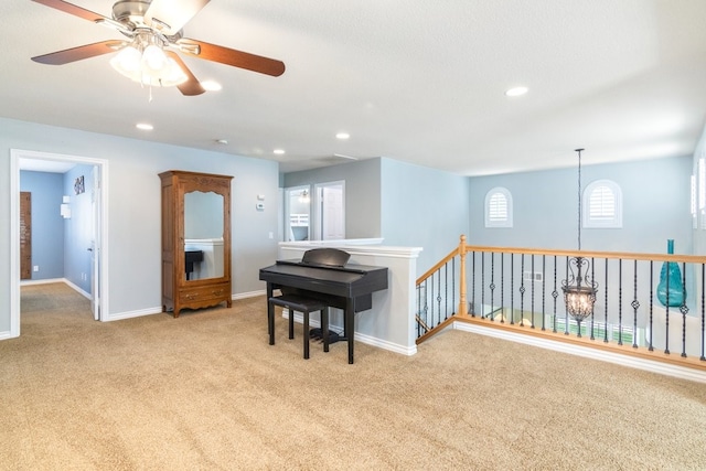 interior space with carpet floors, recessed lighting, an upstairs landing, and baseboards