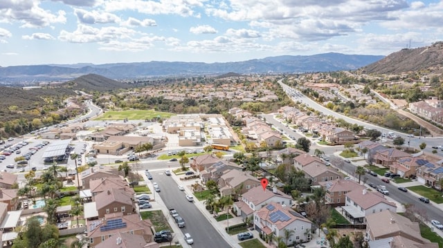 bird's eye view with a residential view and a mountain view