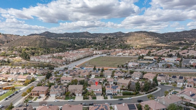 birds eye view of property featuring a residential view and a mountain view