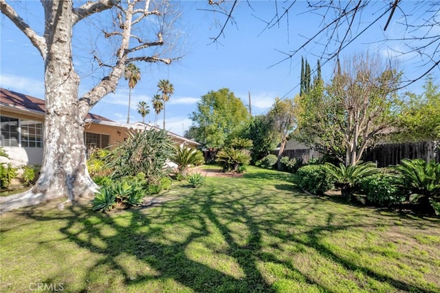 view of yard with fence