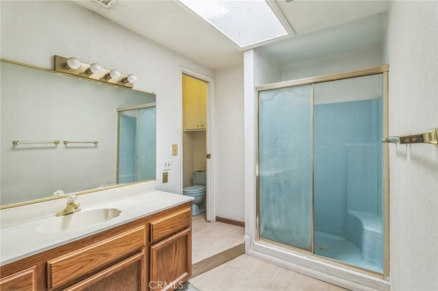 11671 Jacaranda Ave, Hesperia, CA 92345 - bathroom with vanity, a stall shower, toilet, and wood finished floors