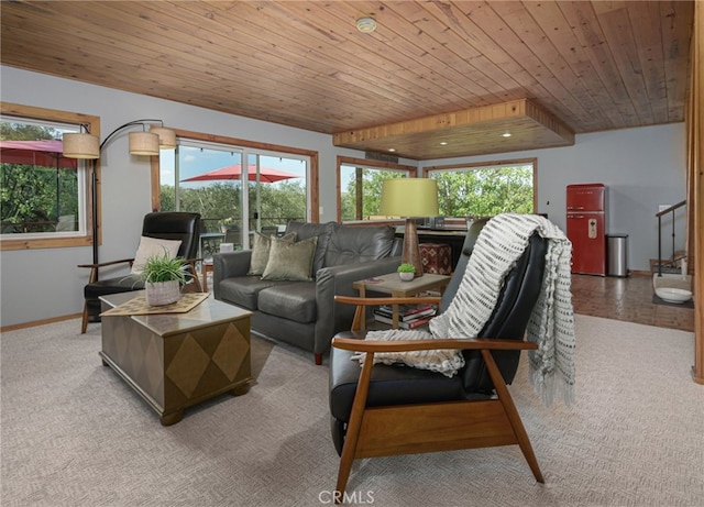 living room featuring wood ceiling, stairway, and baseboards