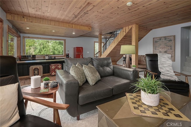 living room featuring wood ceiling, stairway, and recessed lighting