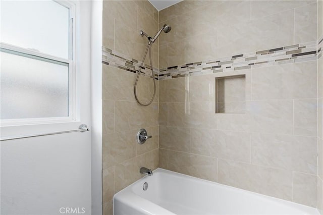 bathroom featuring bathing tub / shower combination