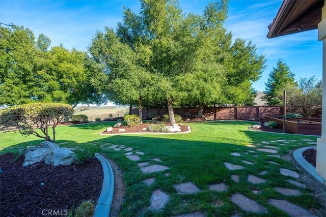 view of yard featuring fence