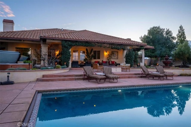 pool featuring a patio