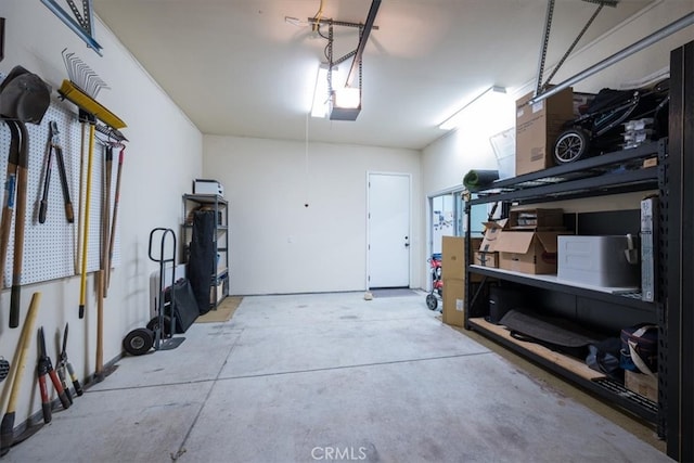 garage featuring a garage door opener