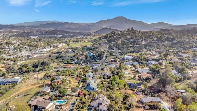 birds eye view of property with a residential view and a mountain view