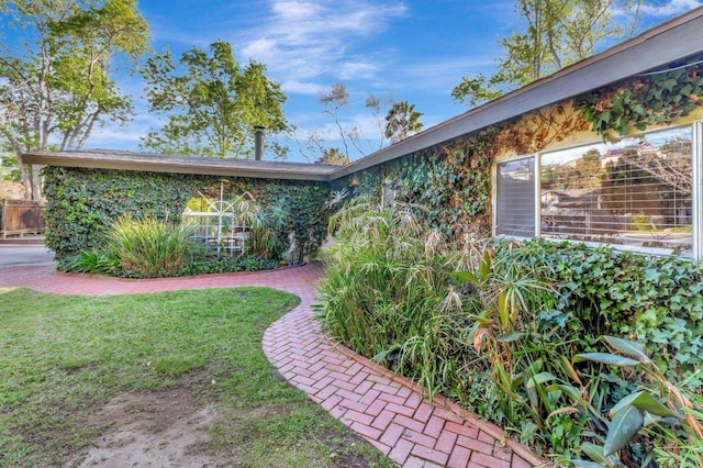 exterior space featuring a lawn