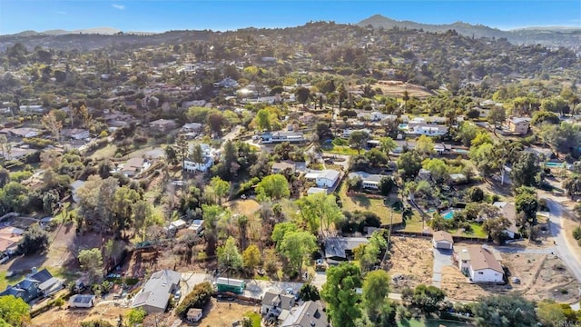 bird's eye view featuring a mountain view and a residential view