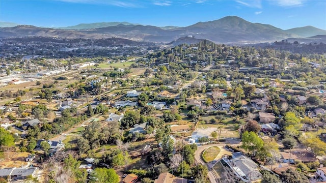 bird's eye view featuring a mountain view and a residential view
