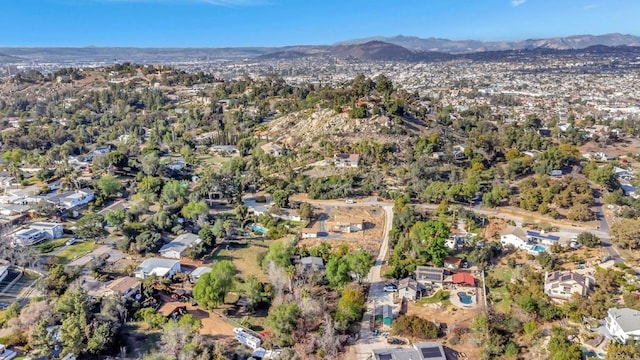 aerial view featuring a residential view and a mountain view