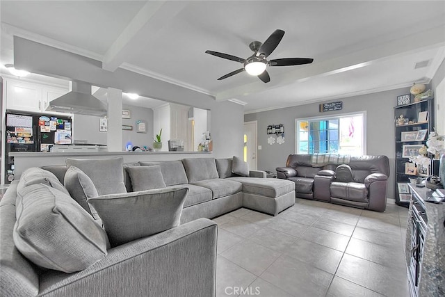 living area featuring ceiling fan, beam ceiling, crown molding, and light tile patterned floors