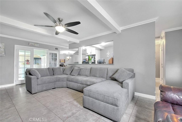 living room with crown molding, light tile patterned flooring, ceiling fan, beamed ceiling, and baseboards