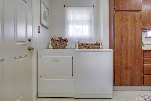 laundry area featuring laundry area and separate washer and dryer